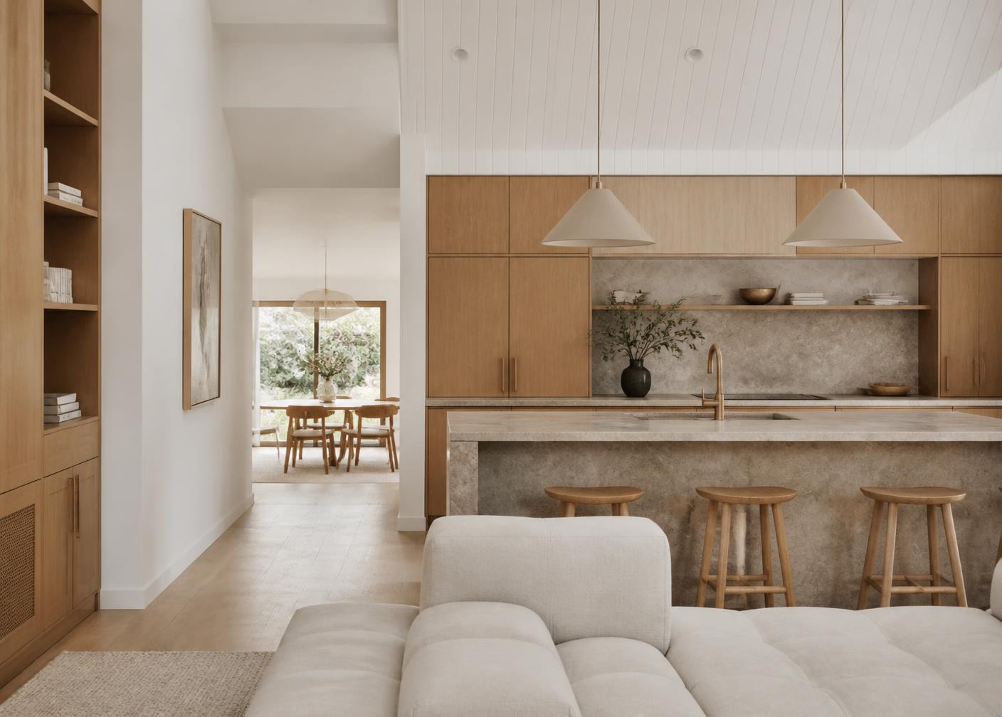 Renovated living and kitchen interior with oak joinery and stone island